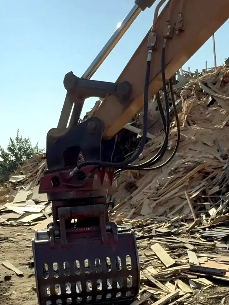 Excavator thumb Neal repaired out on a job site